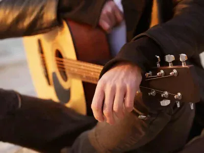 How to Hold an Acoustic Guitar Like a Pro